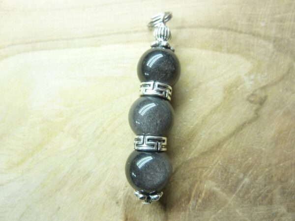 Pendentif Obsidienne argentée perles rondes 10 mm