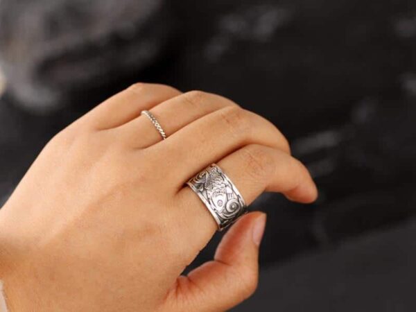 Bague dessin poissons ajustable en argent 995