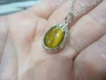 Pendentif Oeil de tigre aile d'ange Argent 925 GG 01M