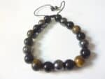 Bracelet réglable Oeil de tigre-obsidienne-hématite-perles 10 mm